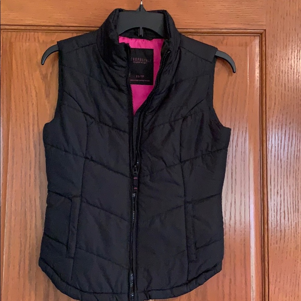 Black vest inside pink